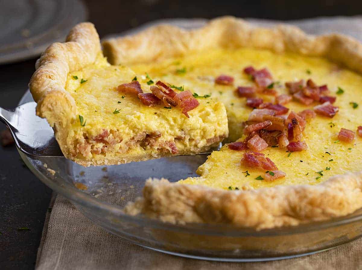 Taking out a slice of Quiche Lorraine