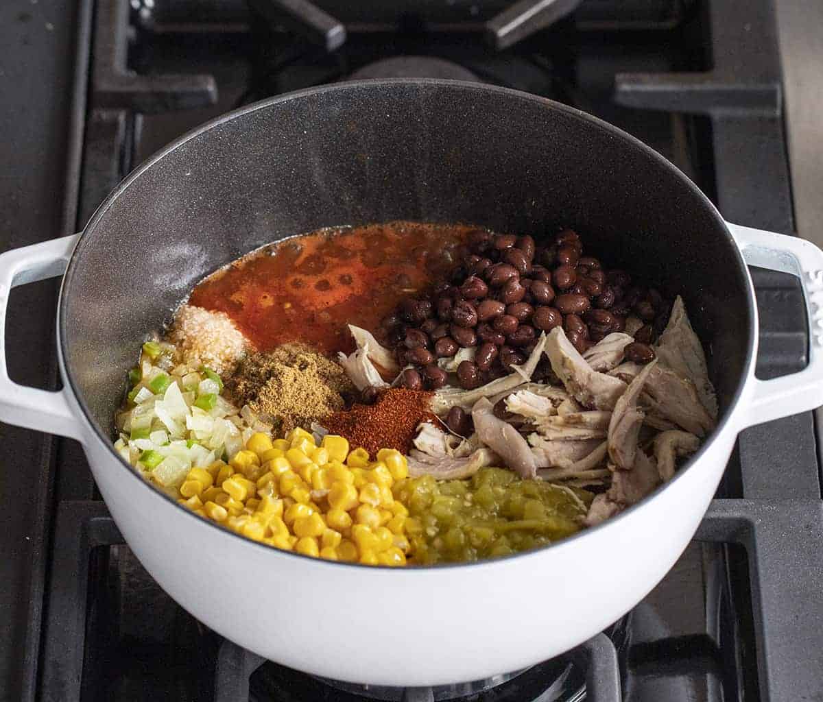 Ingredients for Chicken Tortilla Soup on Stove in a Pot