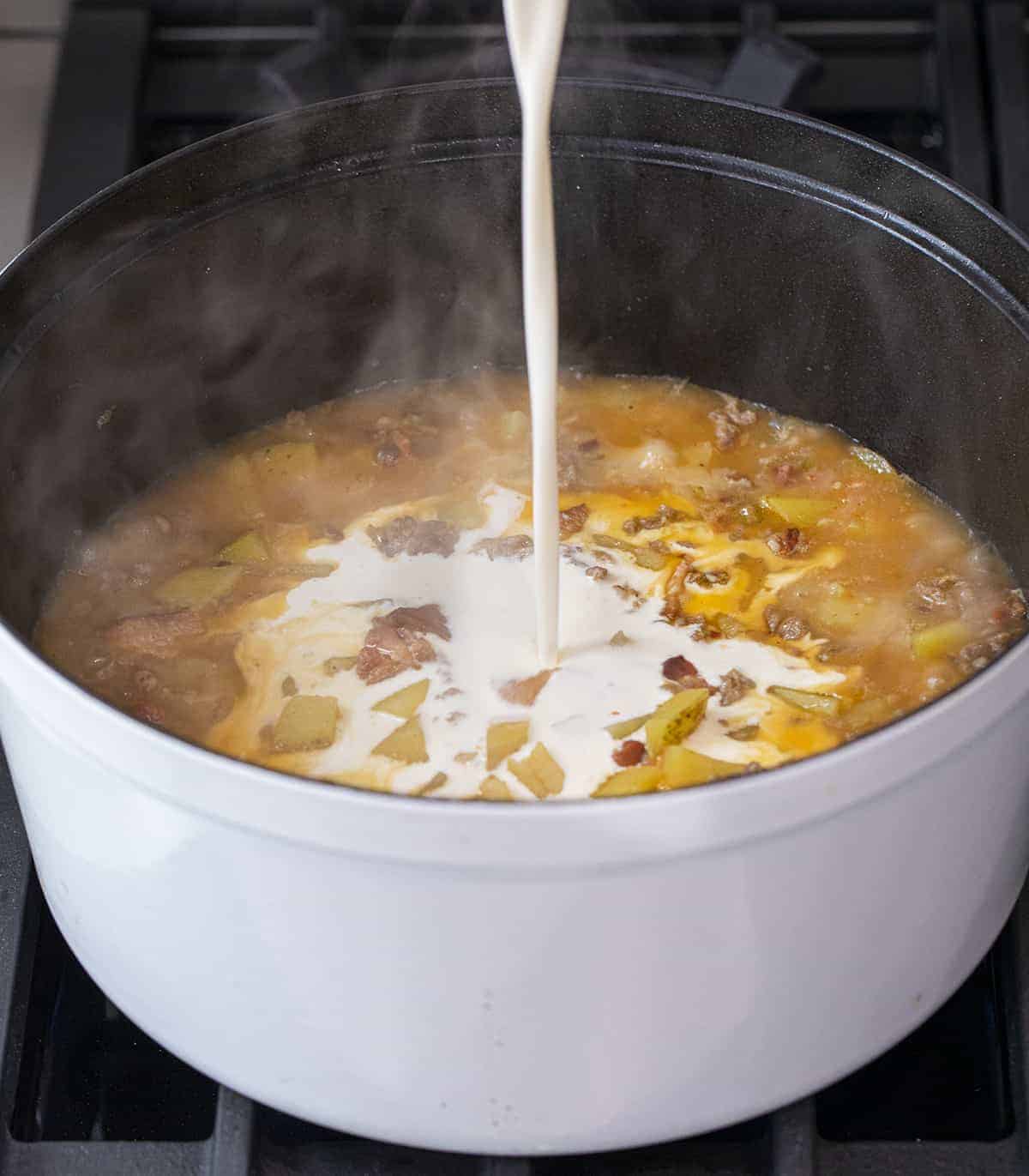 Adding Cream to Zuppa Toscana Soup