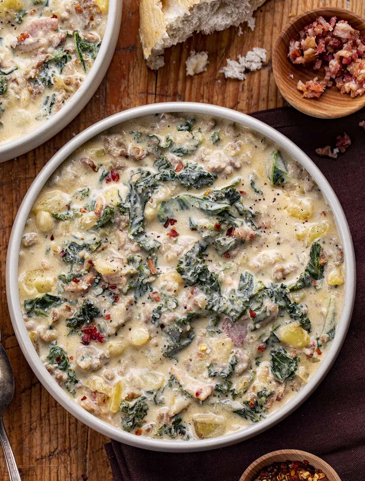 Zuppa Toscana Soup in a Bowl with Another Bowl Nearby