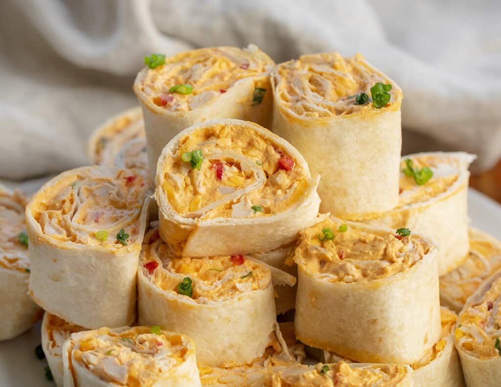 pile of buffalo chicken pinwheels on a plate