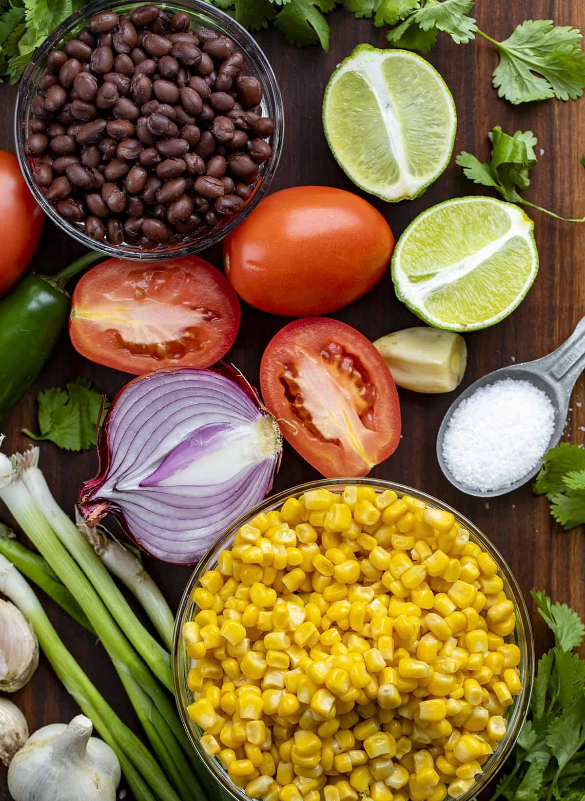 Raw Ingredients for Black Bean Corn Salsa on a Cutting Board