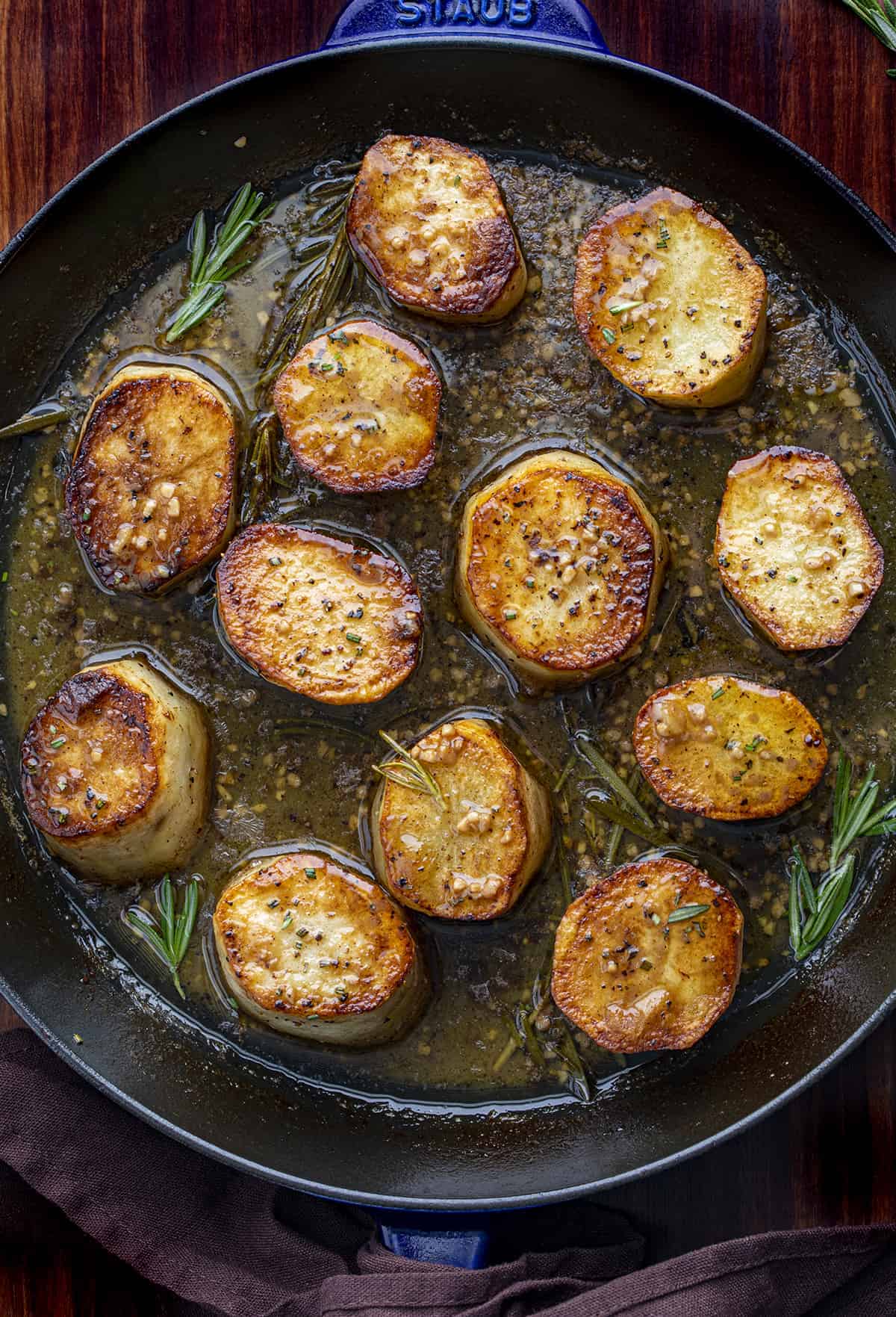Skillet with Fondant Potatoes - Melting Potatoes in it from overhead