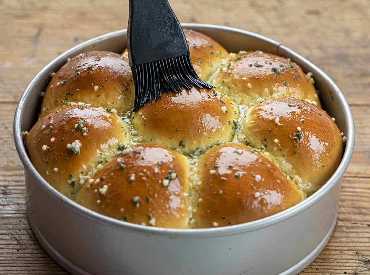 Brushing Garlic Butter onto Garlic Japanese Milk Bread Rolls