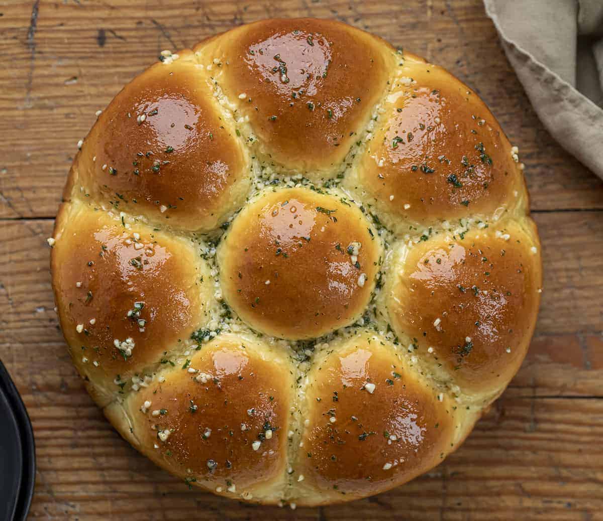 Overhead of Garlic Butter Japanese Milk Bread Rolls on a Cutting Board