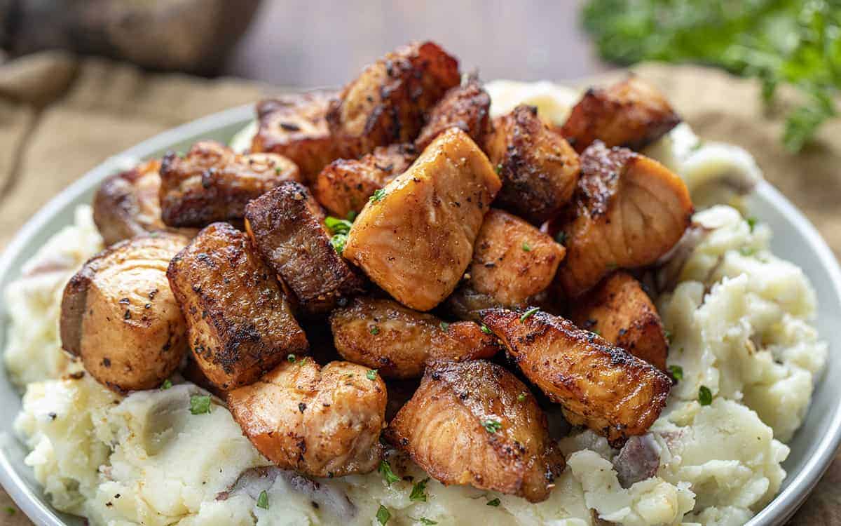 Plate of Air Fryer Salmon Bites on Mashed Potatoes