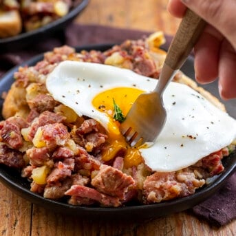Fork Taking a Bite of Corned Beef Hash