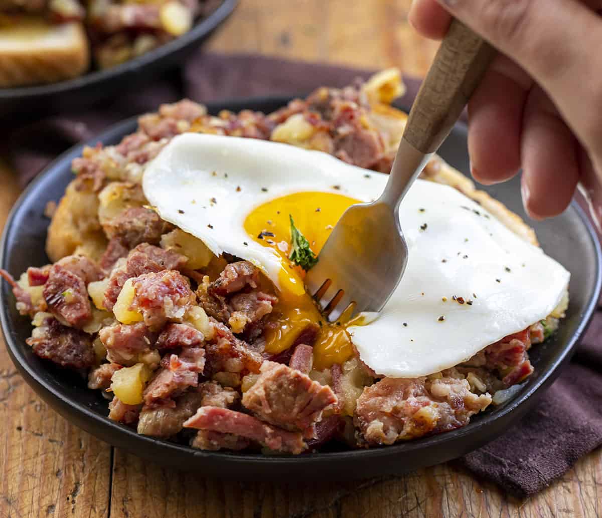 Fork Taking a Bite of Corned Beef Hash