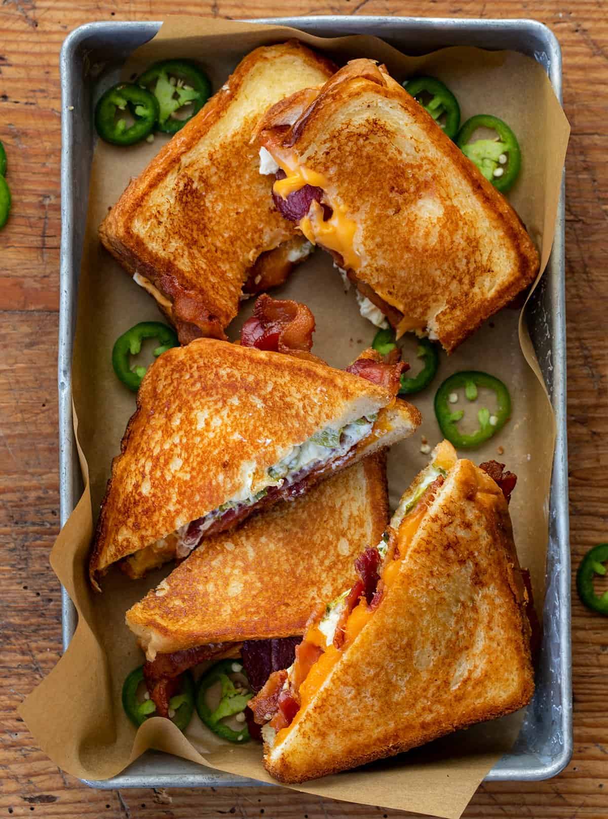 Pan of Roasted Jalapeno Popper Grilled Cheese Sandwiches from Overhead on a Cutting Board