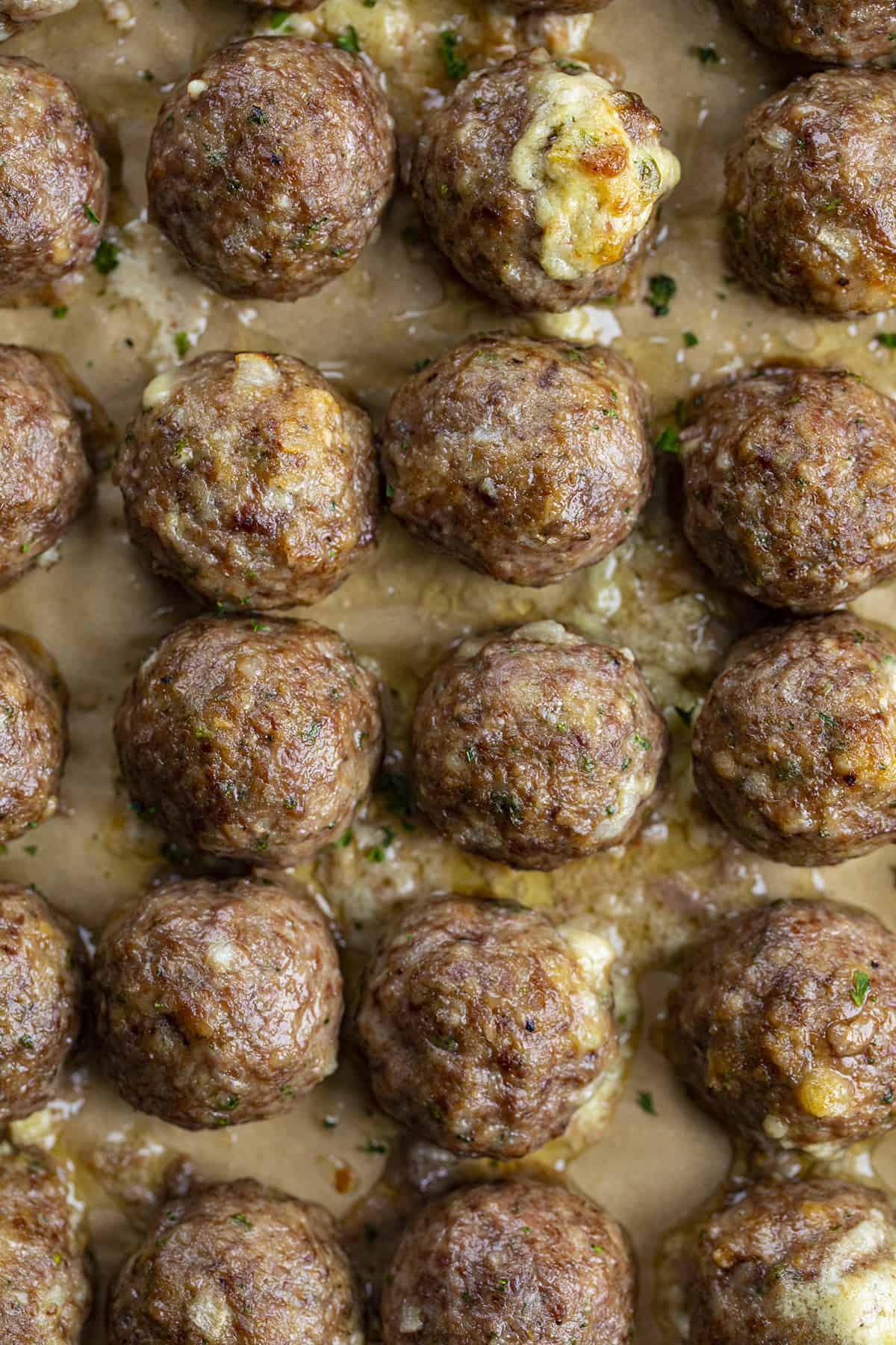 Overhead image of Jalapeno Popper Stuffed Meatballs on Baking Sheet