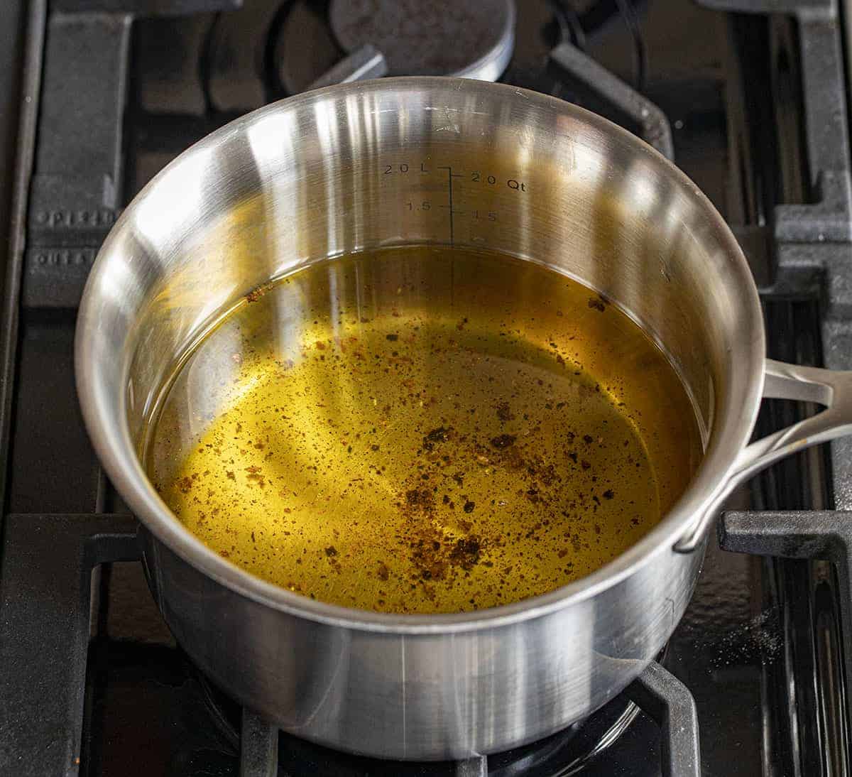 Pan of Dirty Cooking Oil Before Getting to Clarified Oil. How to Clean Used Cooking Oil.