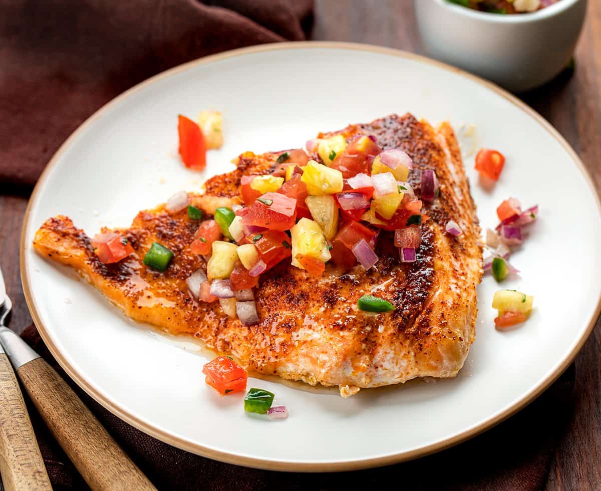 Plate with Piece of Chili Lime Salmon with Pineapple Salsa