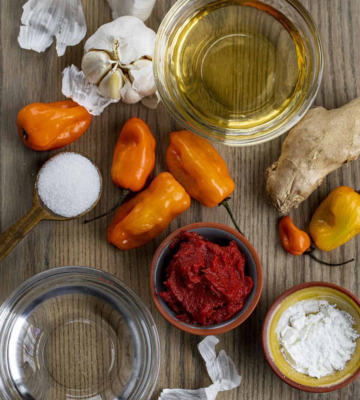 The Raw Ingredients Needed to Make Sweet Chili Sauce Recipe on a Cutting Board.