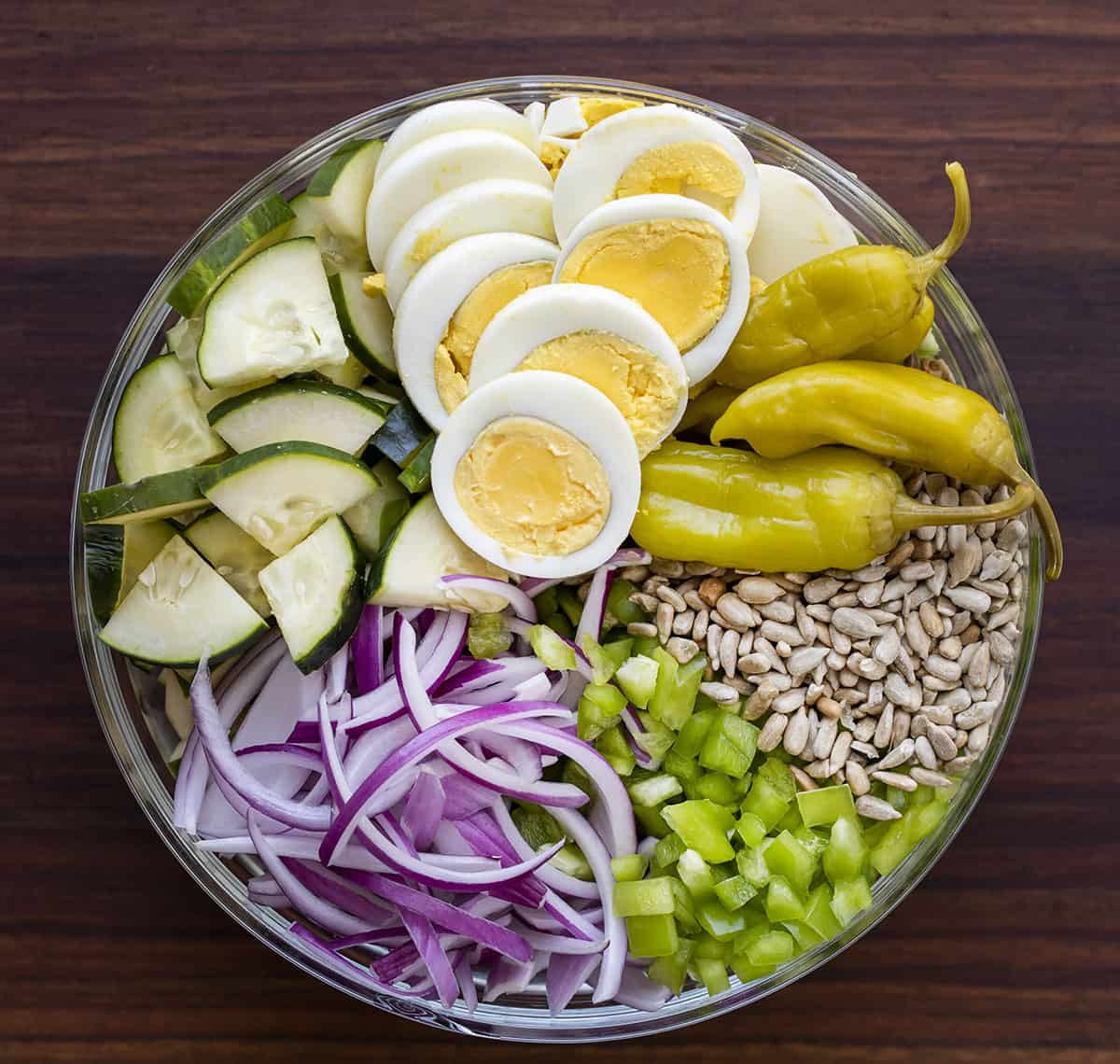 All Ingredients for Hot Girl Salad in a Bowl Sectioned off From Overhead