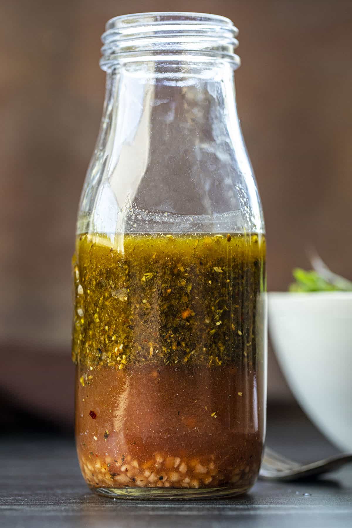 Bottle of Italian Dressing Straight on an Showing Separated Layers