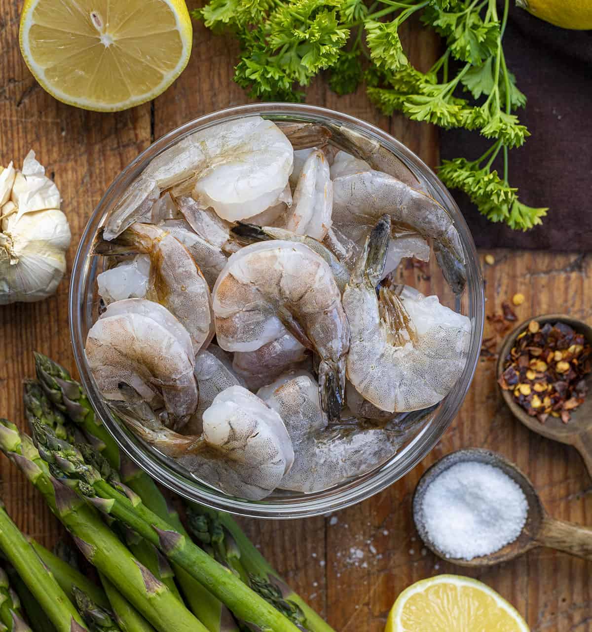 Raw Ingredients ready to be assembled for Shrimp and Asparagus Foil Packets