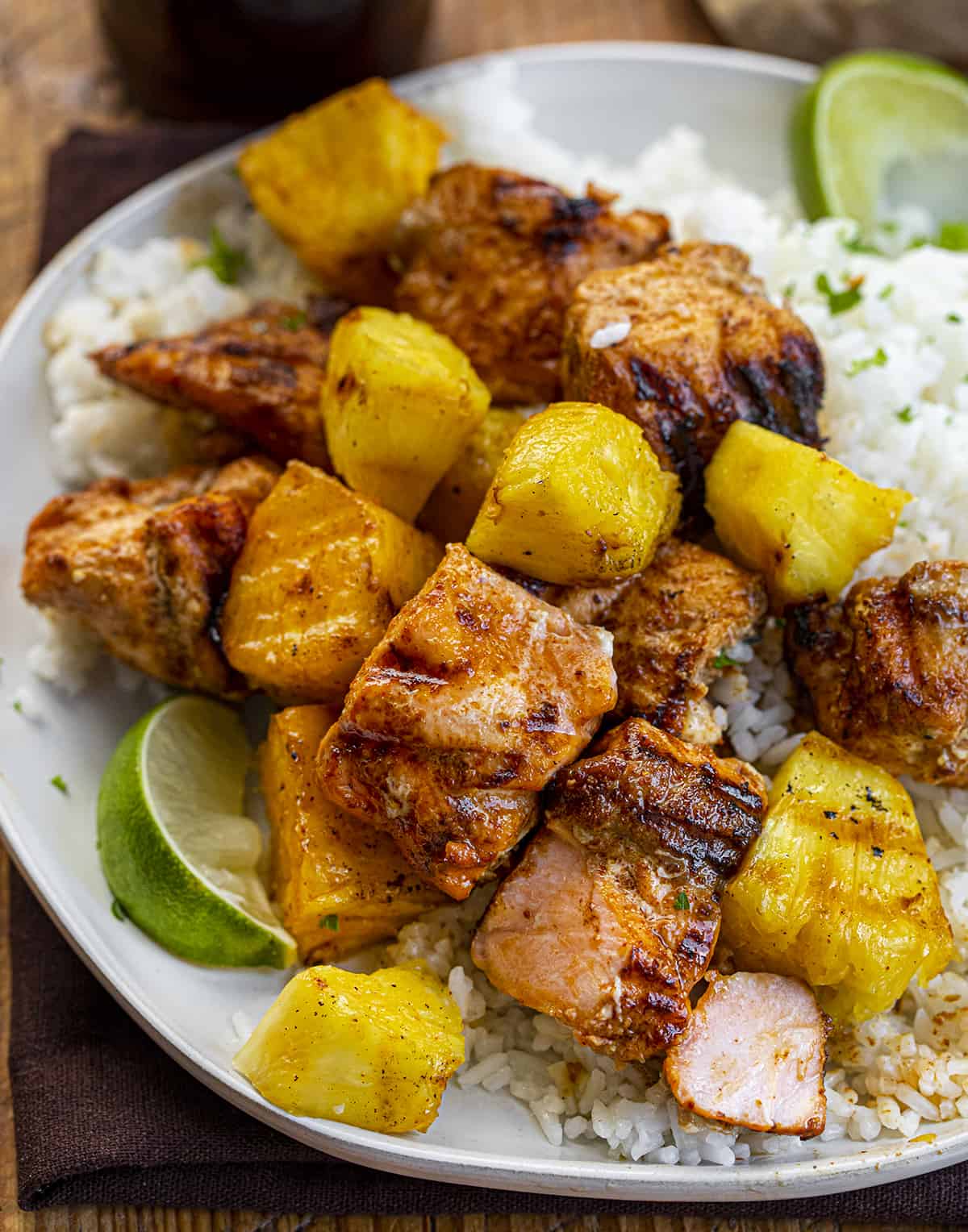 Salmon and Pineapple Kebabs off the Skewer on a Plate with Rice. Dinner, Kebabs, Salmon Kebabs, Pineapple Kebabs, Grilling, Air Fryer Kebabs, Oven Kebabs, Seafood Kebabs, Summer Kebabs, How to Make Kebobs, recipes, i am homesteader, iamhomesteader