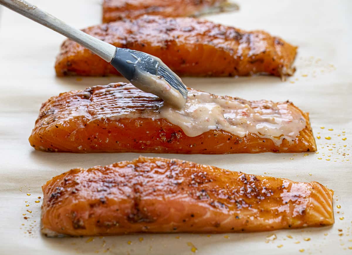 Brushing Bang Bang Sauce over Salmon Before Cooking. Dinner, Supper, Salmon, Salmon Recipes, Sweet Salmon, Bang Bang Sauce, Easy Dinner Ideas, Salmon Recipe Ideas, Salmon Fillets, Skin On Salmon, i am homesteader, iamhomesteader