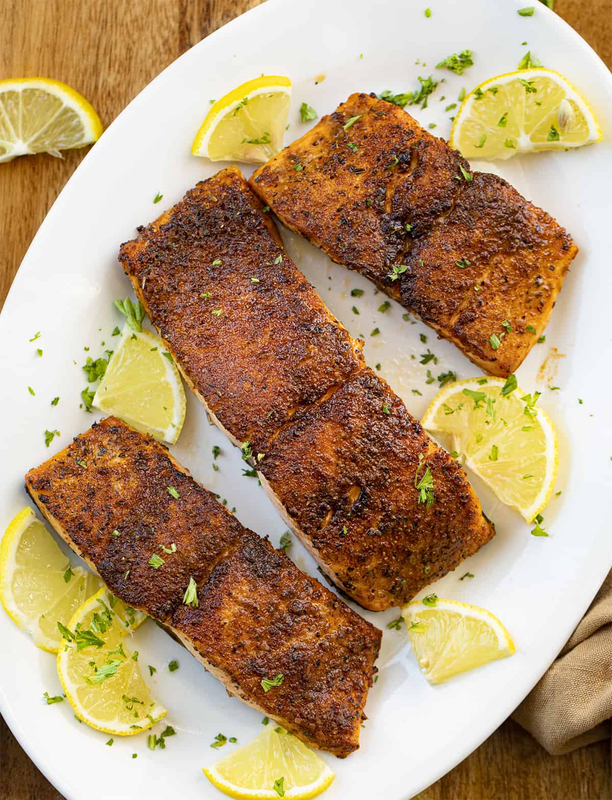 Overhead Image of Blackened Salmon on a Platter. Dinner, Supper, Salmon Recipes, Blackened Salmon, Air Fryer Recipes, How to Make Salmon in the Air Fryer, Baked Salmon, Baked Blackened Salmon, i am homesteader, iamhomesteader