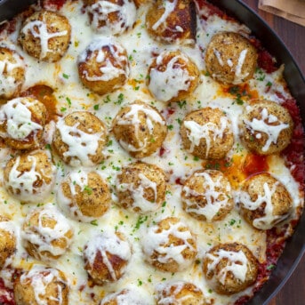 Skillet of Chicken Parmesan Meatballs with Cheese. Dinner, Supper, Meatballs, Chicken Meatballs, Chicken Parmesan Meatballs, Chicken Meatball Recipes, Chicken, Chicken Recipes, Christmas Dinner, i am homesteader, iamhomesteader