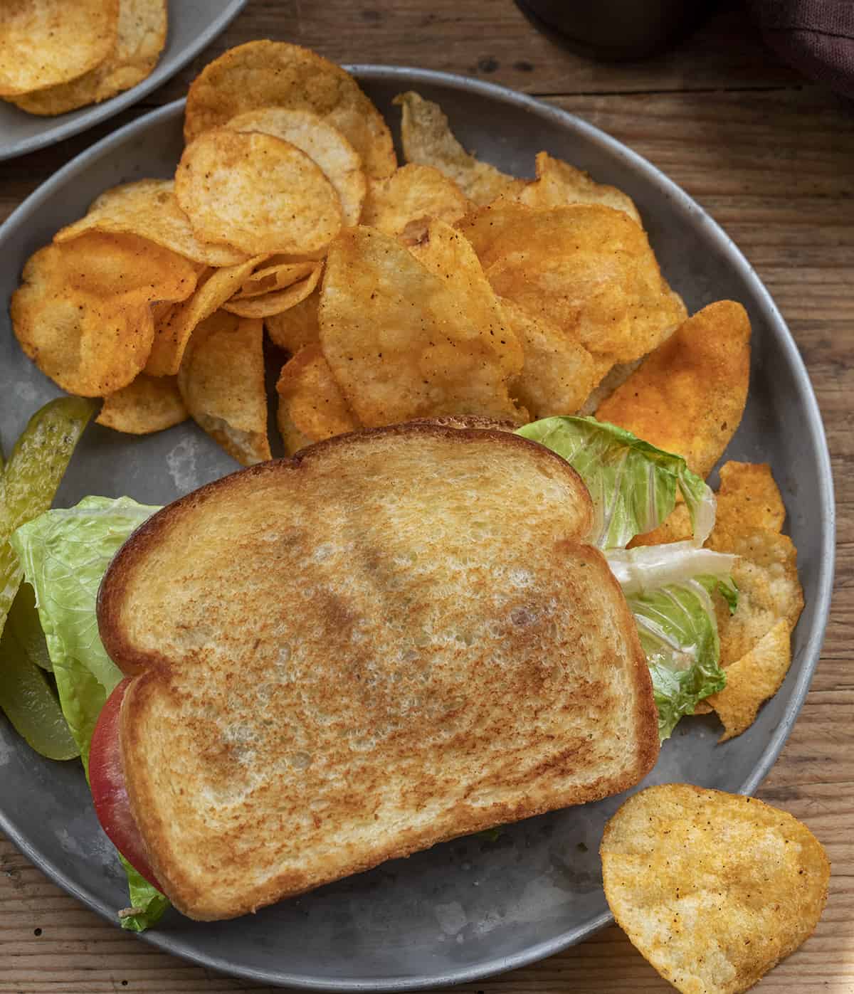 BLT with Tomato Jam on a Plate with Chips. Dinner, Supper, Sandwich, Deluxe BLT, Tomato Jam Sandwich, How to Use Tomato Jam, Toasted BLT, recipes, i am homesteader, iamhomesteader