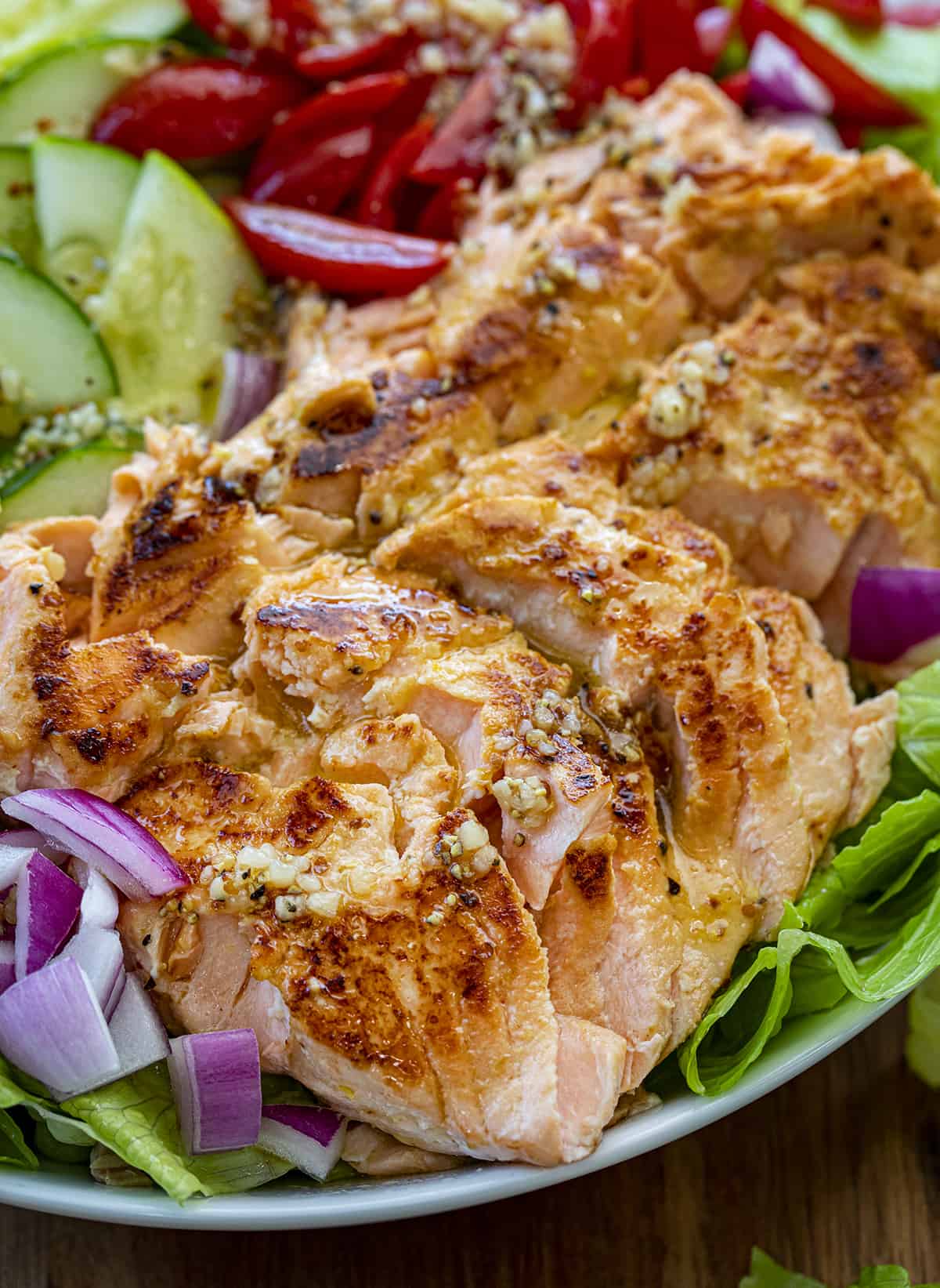 Close up of Salmon Salad in Bowl with Fresh Ingredients. Salad, Summer Salad, Salmon Salad, Hot Salmon Salad, Cold Salmon Salad, Green Salad with Salmon, Dressing for Salmon Salad, Meal Prep Salad, Healthy Salad, Easy Delicious Salad, i am homesteader, iamhomesteader