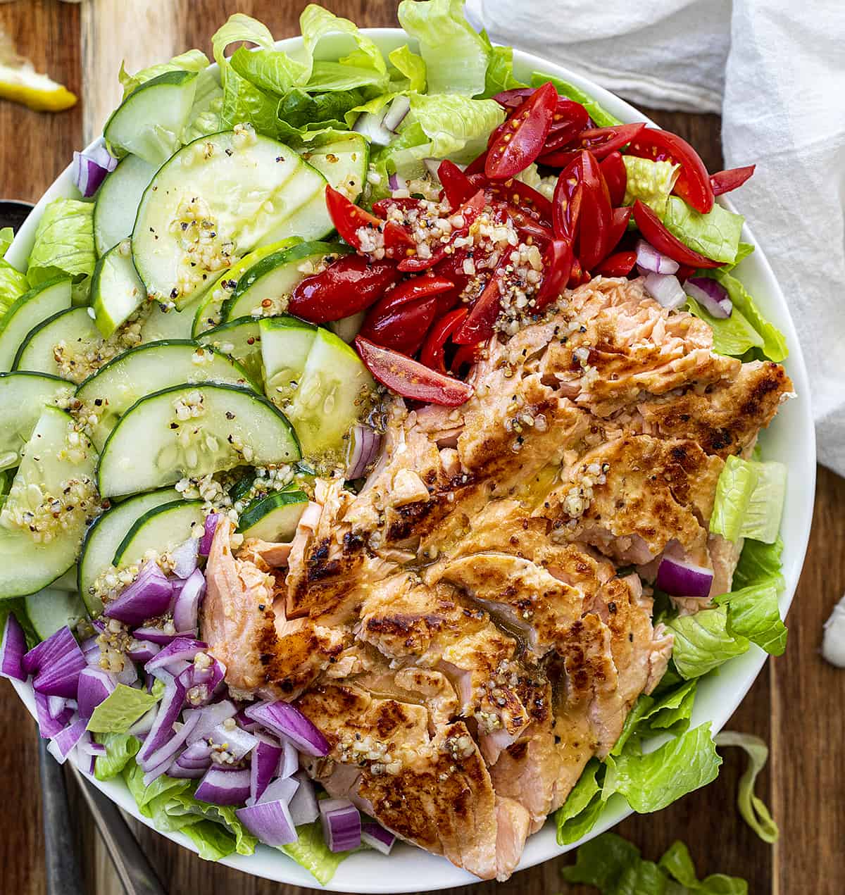 Overhead of Salmon Salad. Salad, Summer Salad, Salmon Salad, Hot Salmon Salad, Cold Salmon Salad, Green Salad with Salmon, Dressing for Salmon Salad, Meal Prep Salad, Healthy Salad, Easy Delicious Salad, i am homesteader, iamhomesteader 