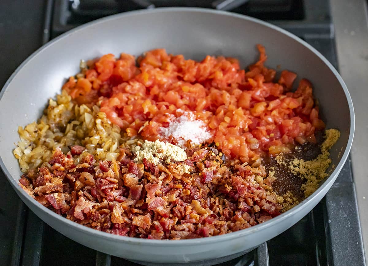 Ingredients for Tomato Bacon Jam in Skillet. Jam, Bacon Jam, Tomato Bacon Jam, Bacon Marmalade, Bacon Jam Recipe, Appetizer, Super Bowl Appetizer, Game Day Food, Best Appetizers, Best Burger Toppings, i am homesteader, iamhomesteader