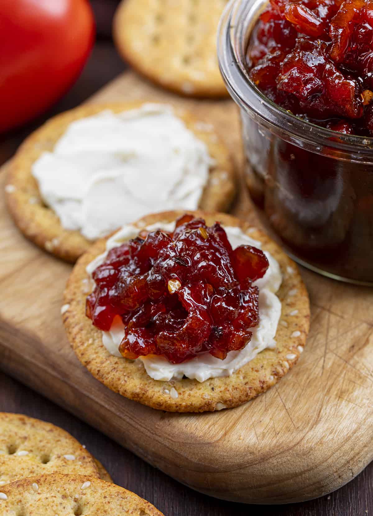 Cracker with Cream Cheese and Spicy Tomato Jam Spread on Top. Appetizer, Burger Topping Idea, Tomato Jam, How to Make Tomato Jam, Spicy Jam, Homemade Tomato Jam, How to Can Tomato Jam, Cracker Spreads, Super Bowl Food, Christmas Appetizers, Thanksgiving Appetizers, i am homesteader, iamhomesteader