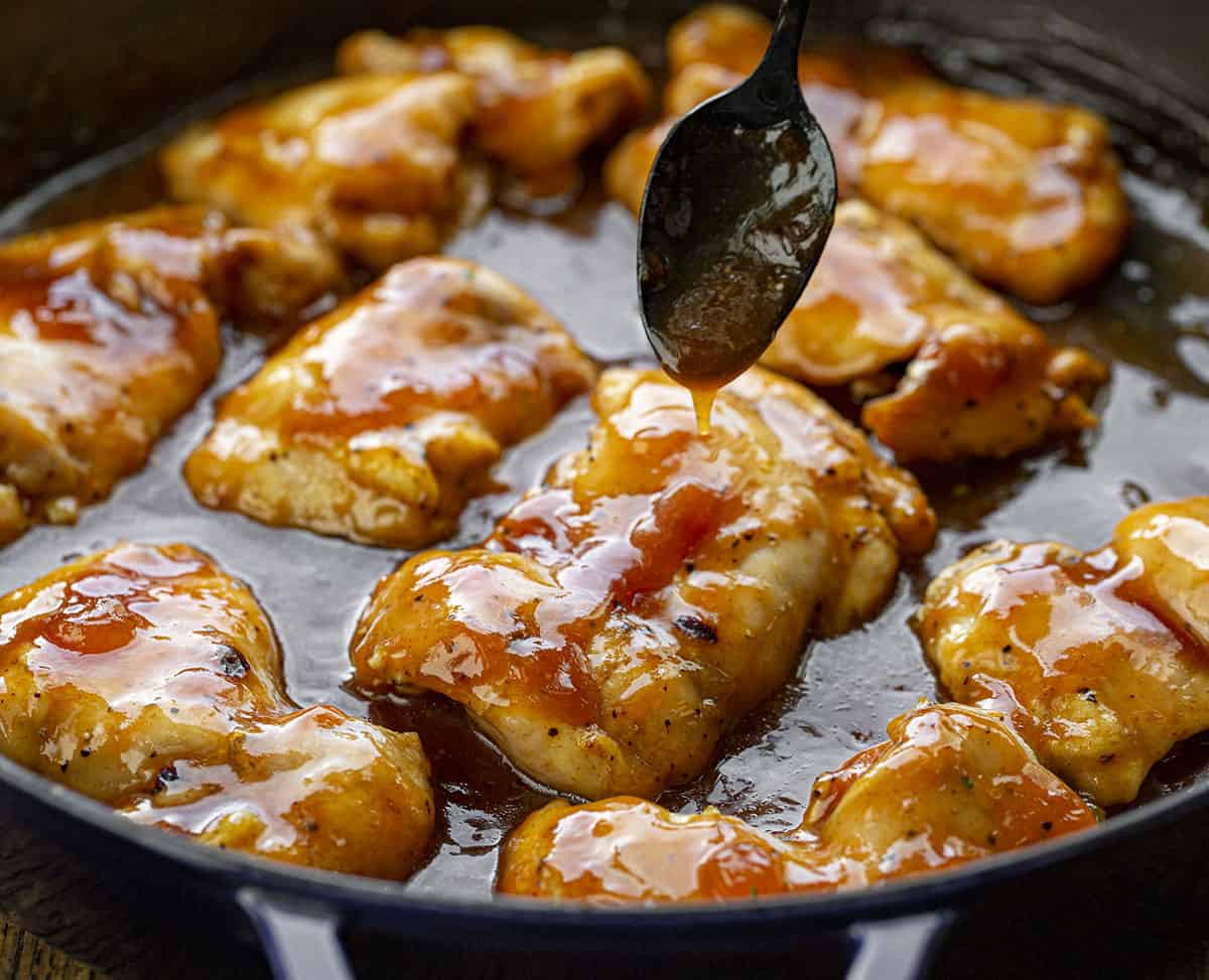 Spooning Sauce over APricot Chicken Thighs. Dinner, Supper, Chicken Recipes, Chicken Thigh Recipes, Apricot Chicken, Easy Chicken Recipes, i am homesteader, iamhomesteader