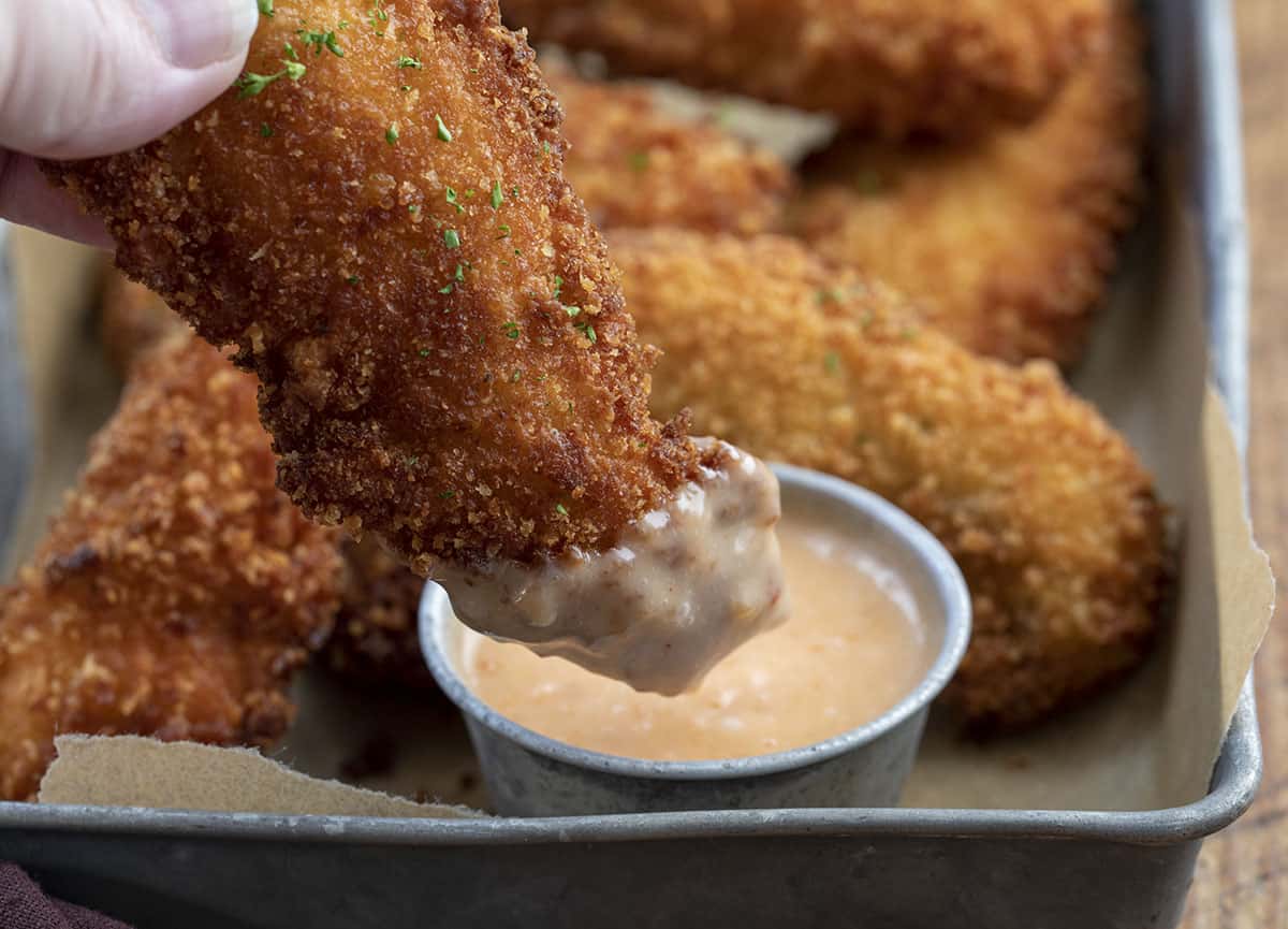 Dipping Crispy Chicken into Bang Bang Sauce. Dinner, Supper, Bang Bang Sauce, Bang Bang Chicken Recipe, Chicken Recipes, Appetizer, Crispy Fried Chicken Recipe, How to Cook Chicken Tenders, recipes, i am homesteader, iamhomesteader