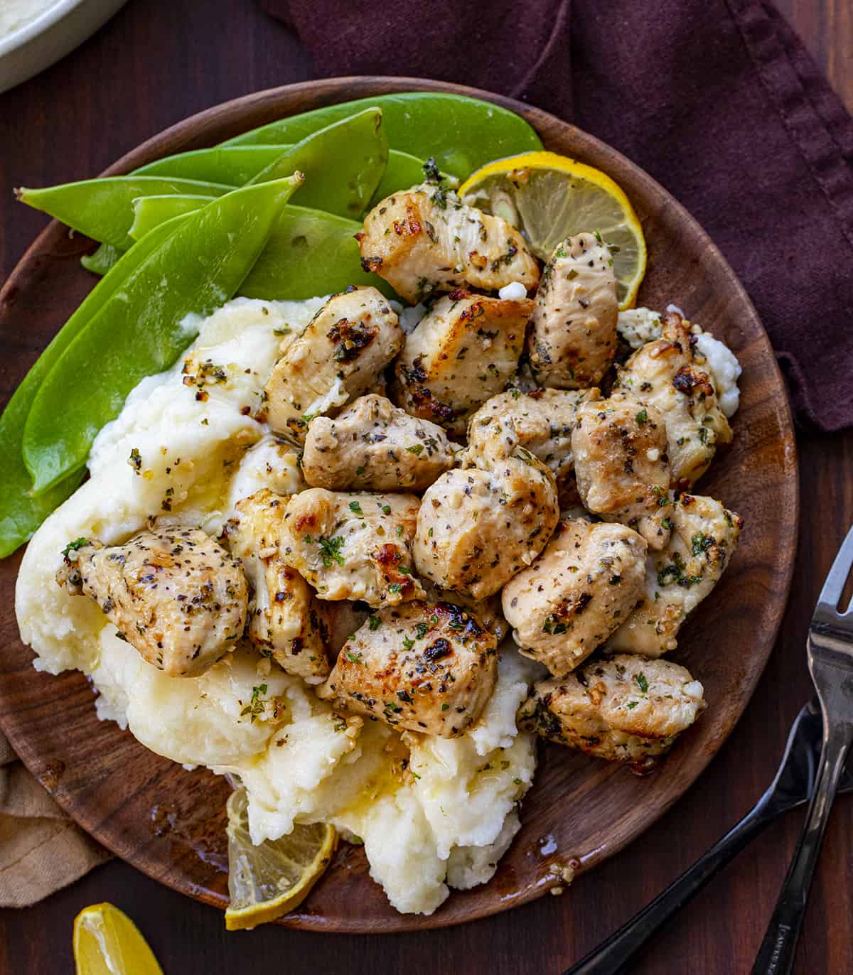 Lemon Garlic Chicken Bites on a Plate over Mashed Potatoes. Dinner, Supper, Chicken Bite Recipes, Chicken Recipes, How to Make Chicken Bites, Easy Chicken Bites, Quick Chicken Dinners, Lemon Chicken, Garlic Chicken, i am homesteader, iamhomesteader