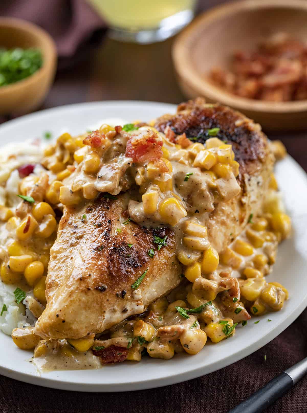 Plate with Mashed Potatoes and Chicken Bacon Creamed Corn. Dinner, Supper, Chicken, Chicken Recipes, Chicken with Creamed Corn, Garlic Butter Creamed Corn Chicken, Dinner Ideas, homestead recipes, recipes, i am homesteader, iamhomesteader