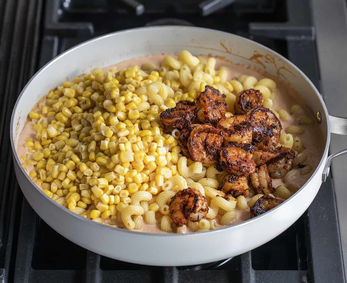 Ingredients for Blackened Shrimp Cavatappi in a Pan Before Being Stirred and Served.