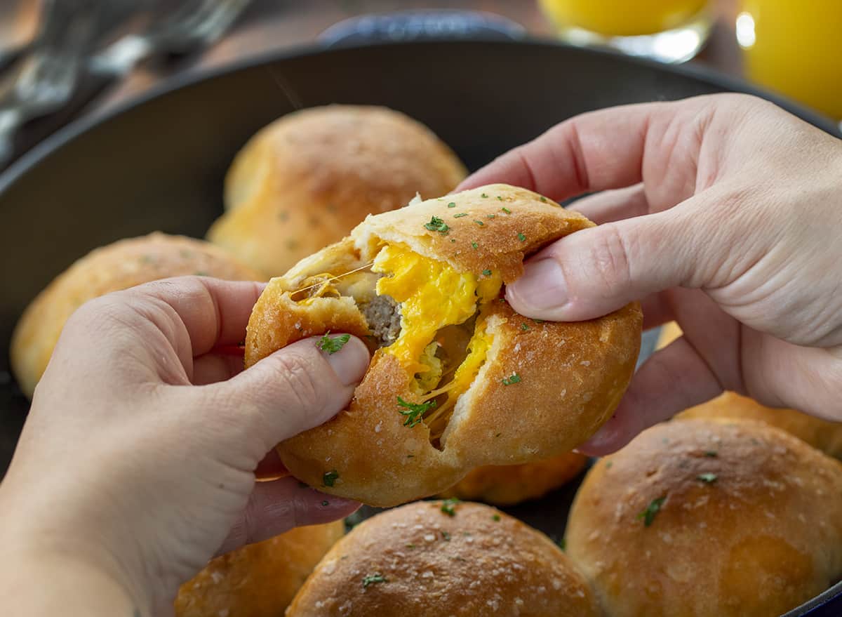 Hands Pulling Apart a Sauge Egg and Cheese Breakfast Bomb. Breakfast, Easy Breakfast, Kid Breakfast, Breakfast Ideas, Sausage and Egg Breakfast, Sausage Egg Cheese Breakfast, Hot Breakfast, Brunch, Brunch IDeas, brunch recipes, i am homesteader, iamhomesteader