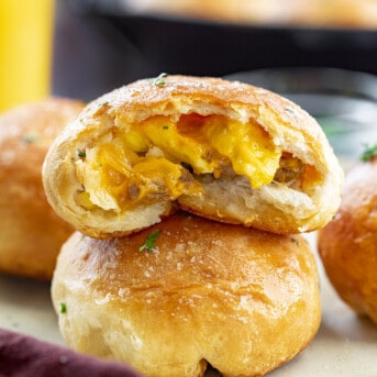Stacked Breakfast Bombs Showing Inside with Cheesy and Eggs. Breakfast, Easy Breakfast, Kid Breakfast, Breakfast Ideas, Sausage and Egg Breakfast, Sausage Egg Cheese Breakfast, Hot Breakfast, Brunch, Brunch IDeas, brunch recipes, i am homesteader, iamhomesteader