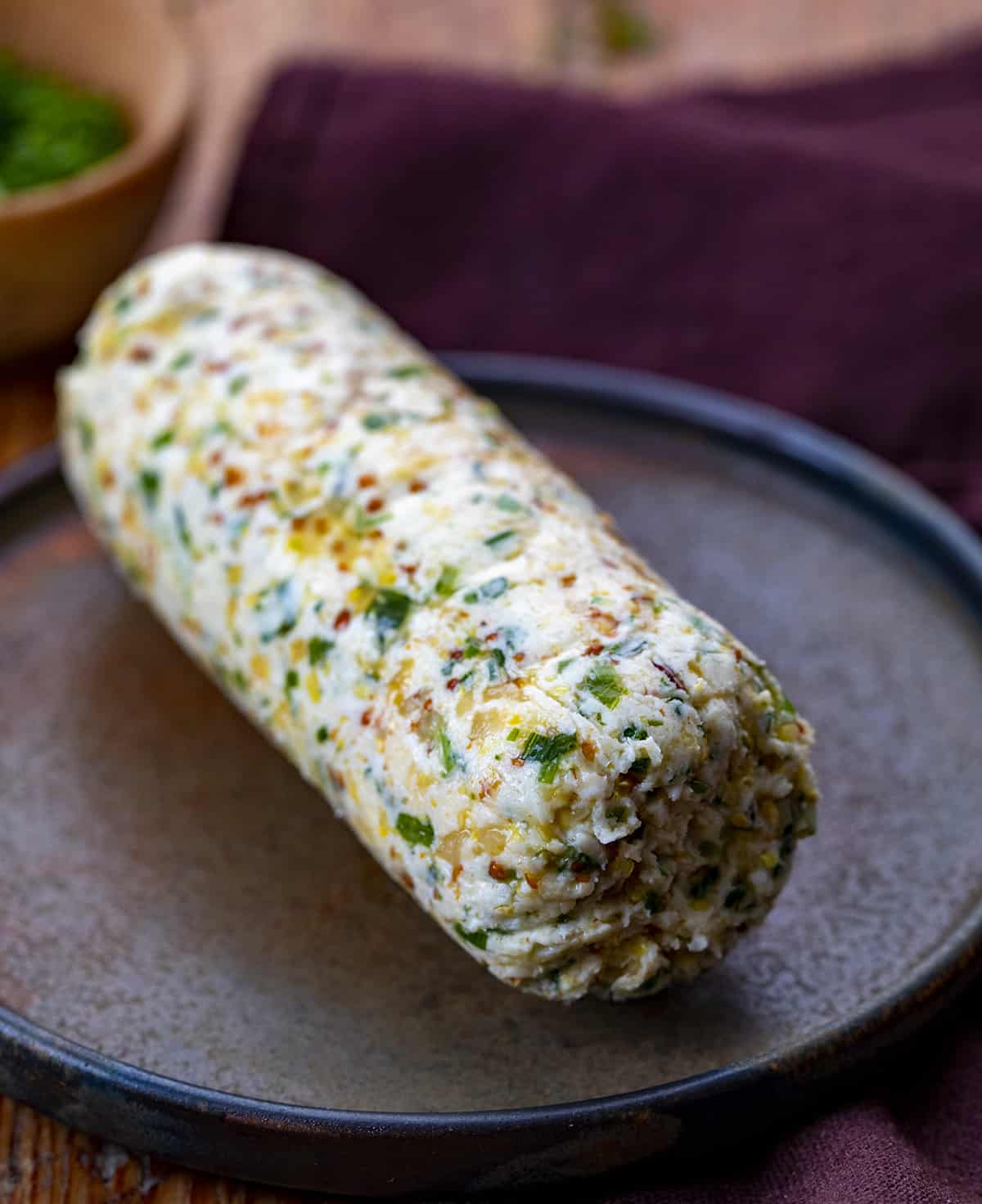 Roll of Cowboy Butter on a Plate.