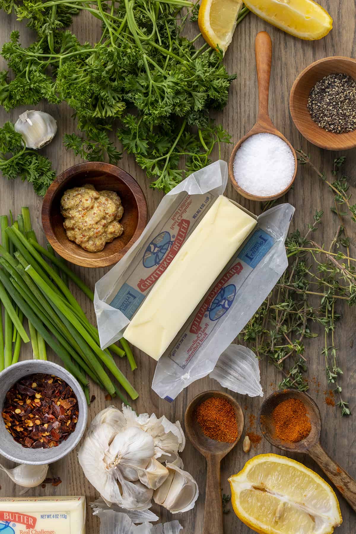 Raw Ingredients on a Cutting Board that Go Into Cowboy Butter.