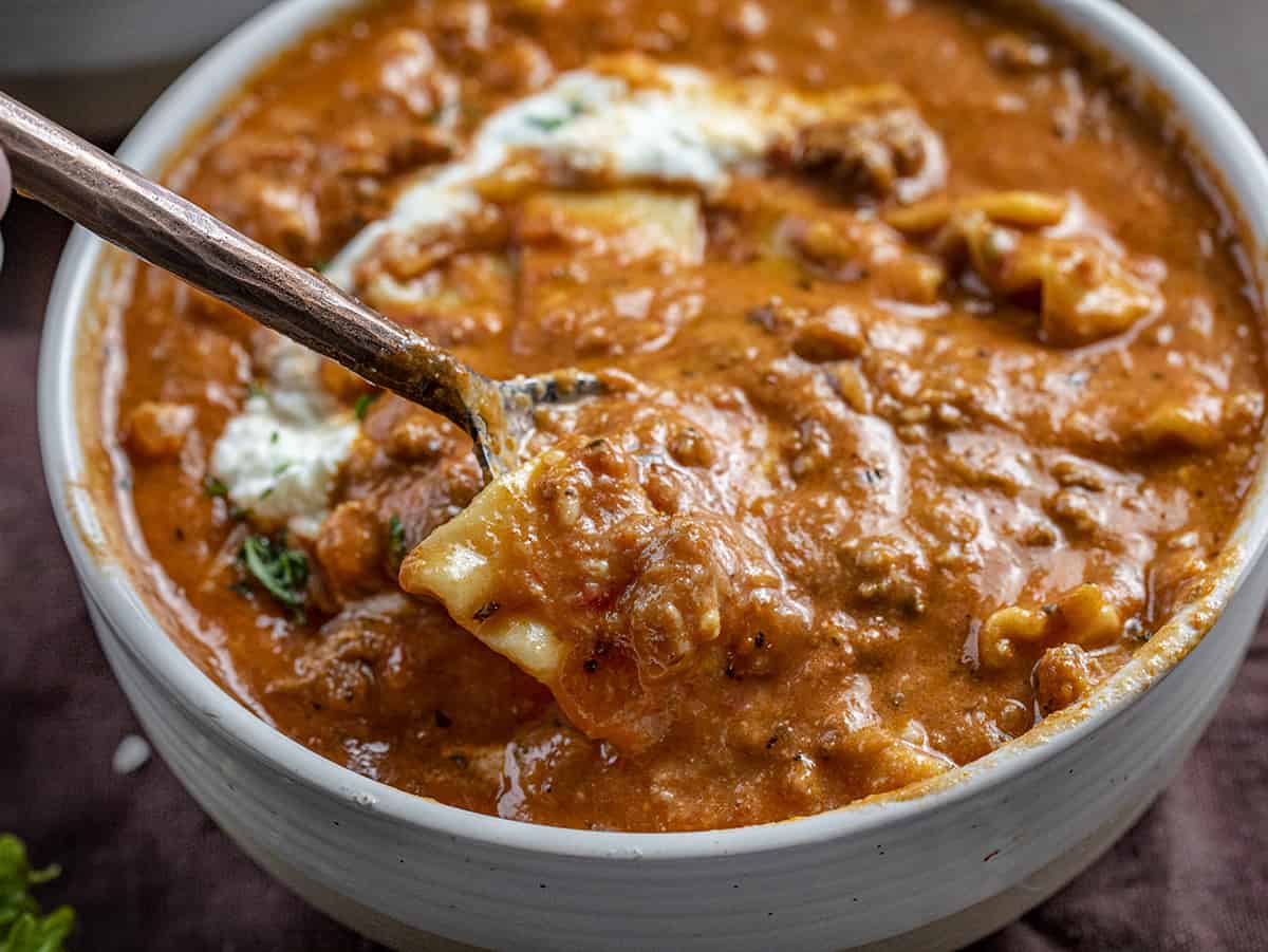 Spoon Taking Bite of Lasagna Soup. Soups, Hearty Soups, Lasagna, Comfort Food, Winter Soups, Fall Soups, Easy Soups, Dinner, Supper, How to Make the Best Lasagna Soup, i am homesteader, iamhomesteader