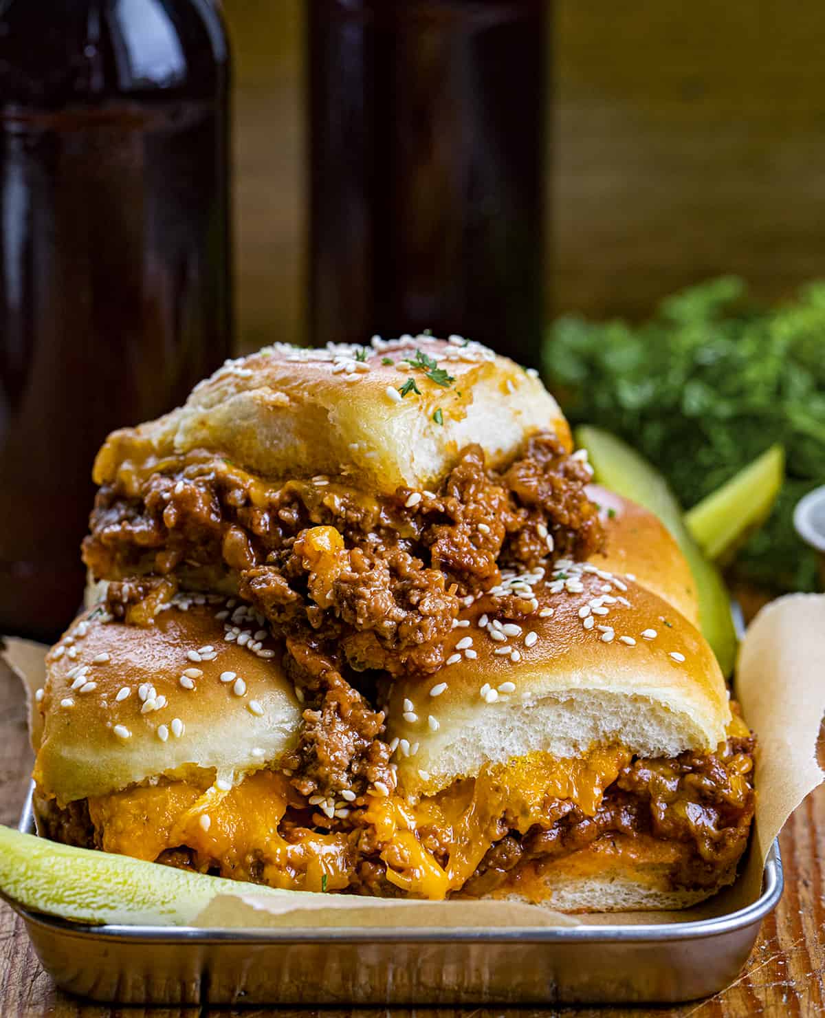 Sloppy Joe Sliders on a Try Stacked up and Filling Spilling out.