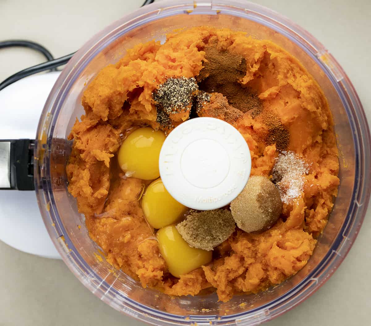 Ingredients for Sweet Potatoes with Pecan Streusel Topping in a Food Processor.