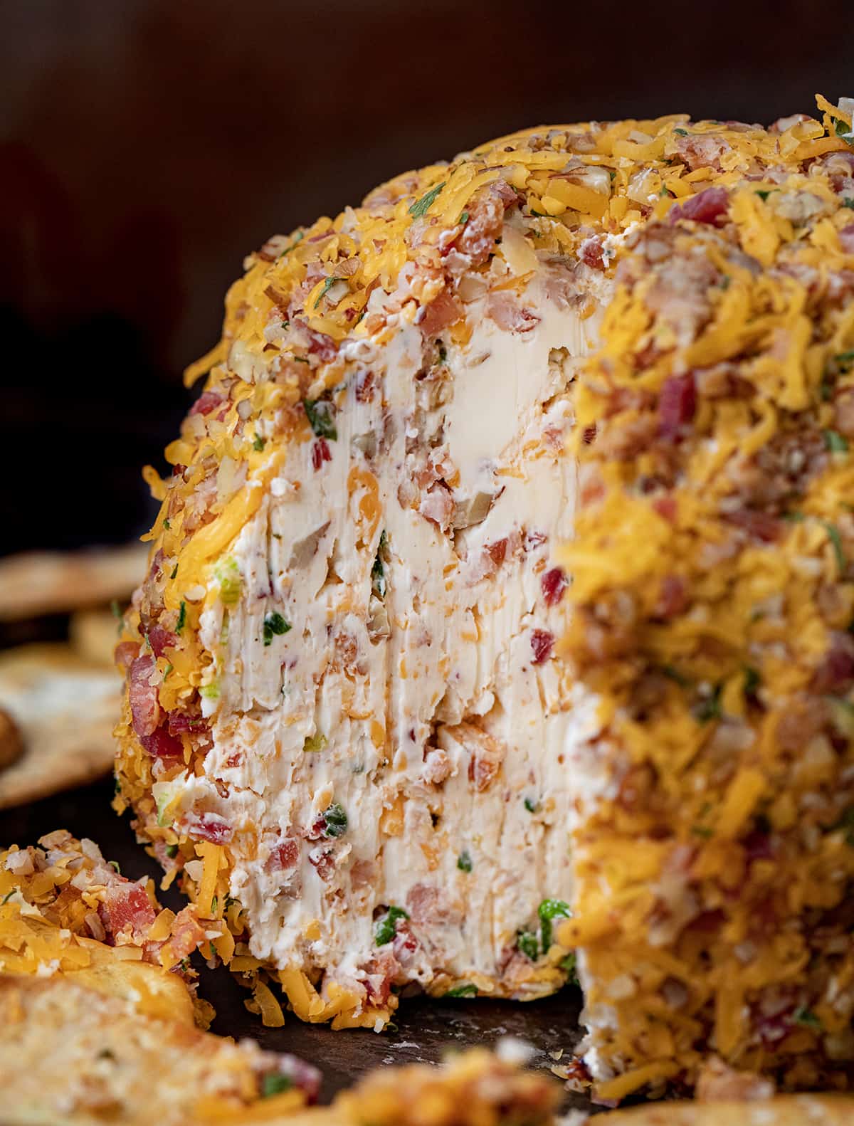 Inside of a Classic Cheeseball that Has Been Cut Into Showing Texture.