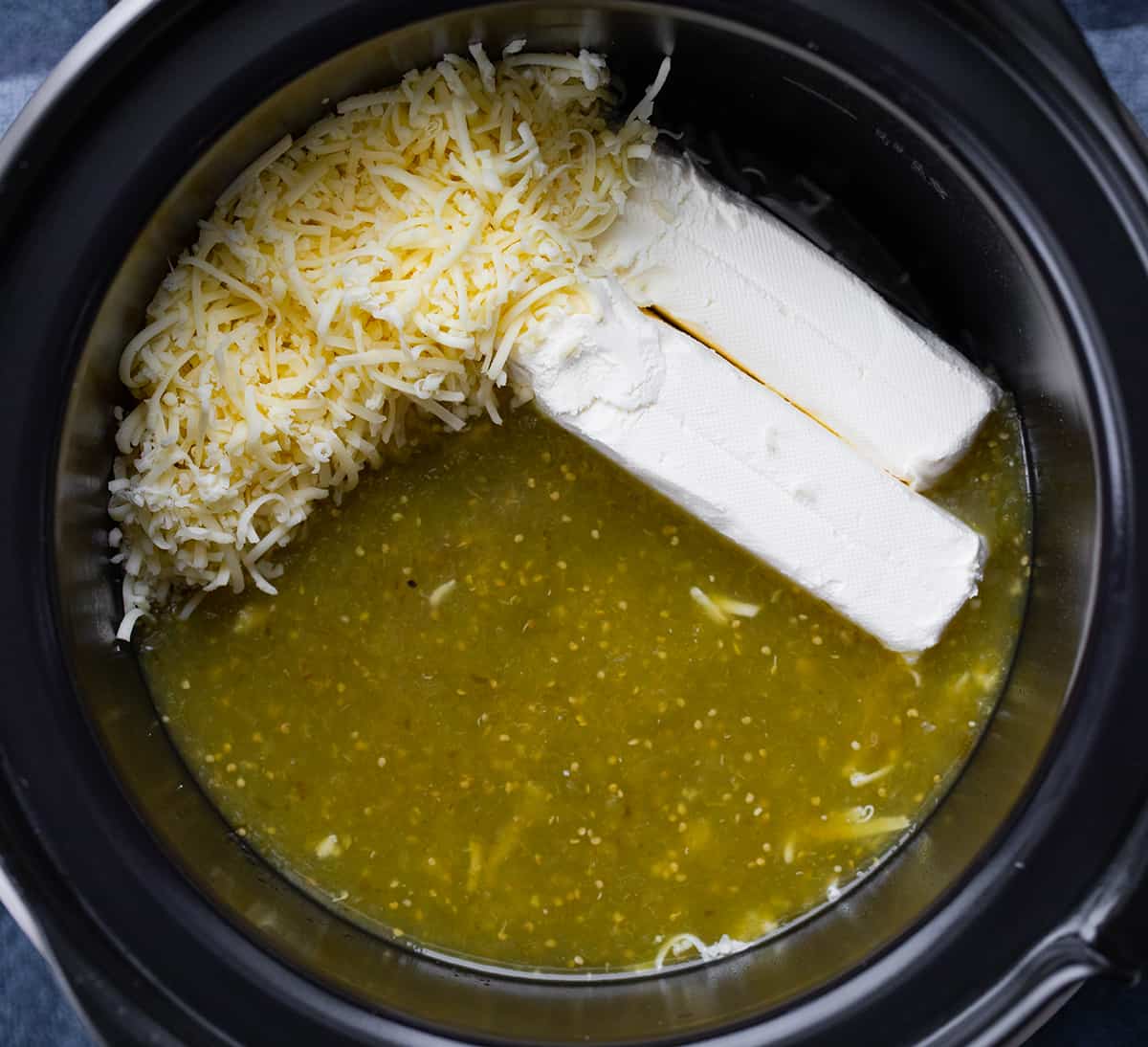 Easy Queso ingredients in a crockpot.