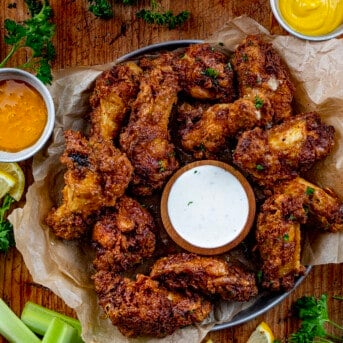 Pan of Buffalo Honey Mustard Chicken Wings with Sauces.