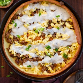 A Savory Sausage Dutch Baby From Overhead In the Skillet.