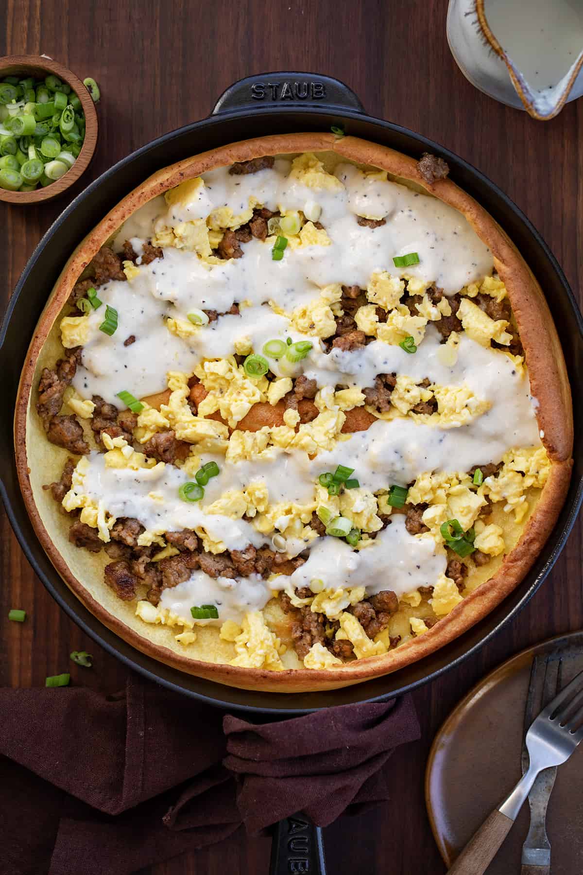 A Savory Sausage Dutch Baby From Overhead In the Skillet.