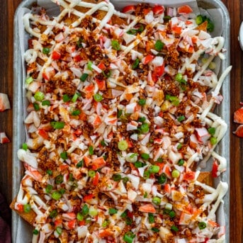 Pan of Crab Rangoon Nachos on a Cutting Board.