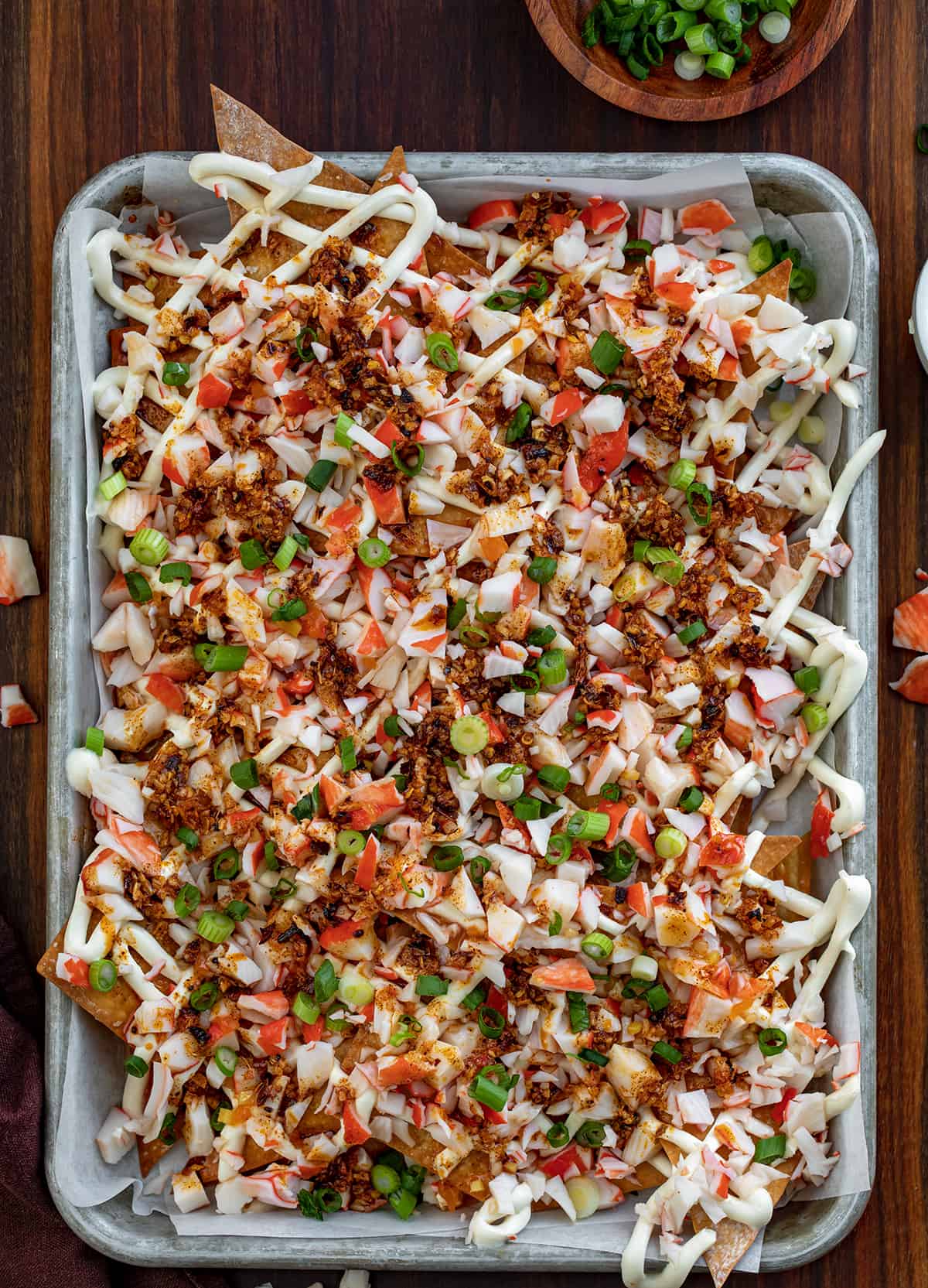 Pan of Crab Rangoon Nachos on a Cutting Board.