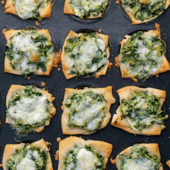 Pan of Just Baked Spinach Dip Bites Close up in The Pan.