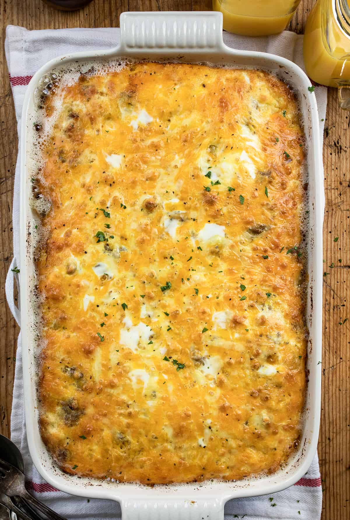 Casserole Dish of Butter Biscuit Breakfast Bake on a Cutting Board. 